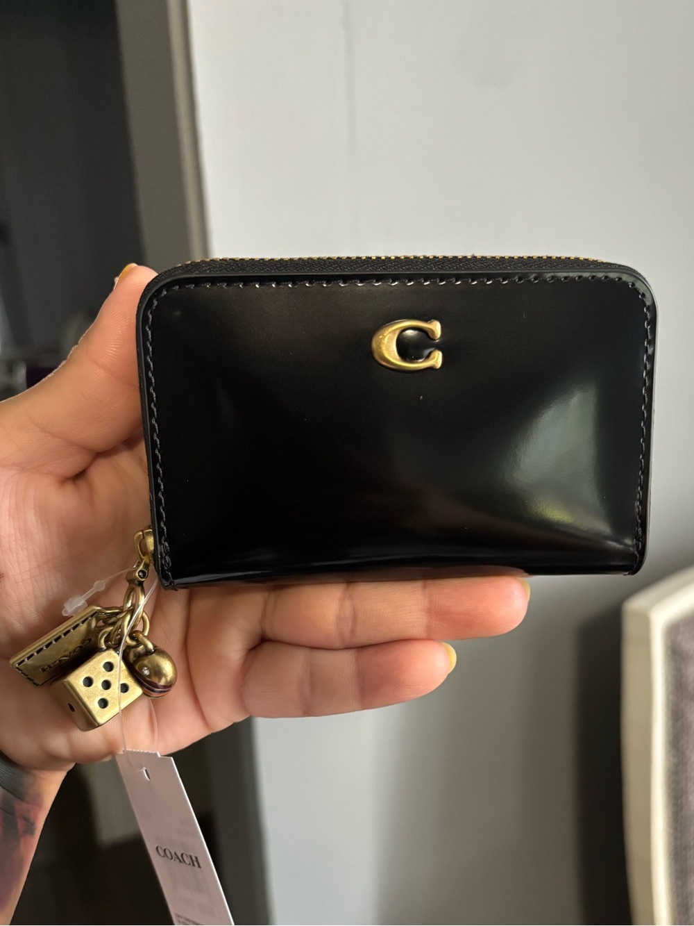 Coach Black Spazzolato Leather Zip Card Case with Gold Charms